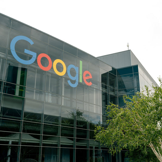 A federal courtroom with a judge presiding over an antitrust case involving a major technology company.
