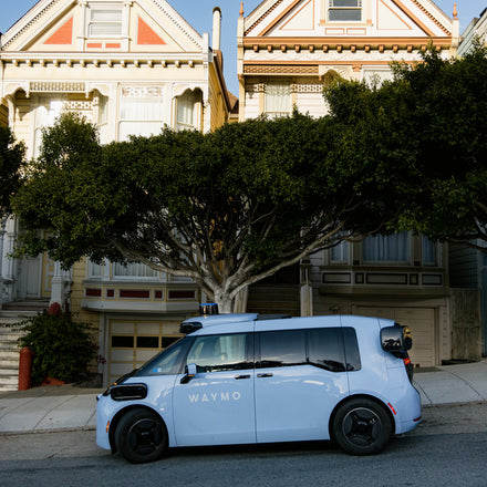 A Waymo driverless car on the road
