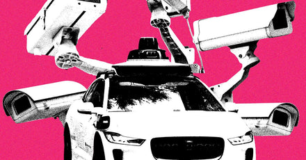 Interior view of a Waymo autonomous taxi showing a ceiling-mounted camera aimed at the passenger seat