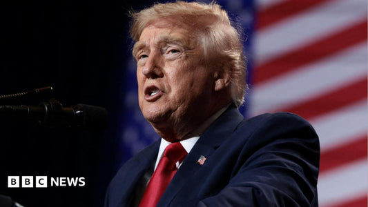 Portrait of Donald Trump speaking at a podium with a map of Ireland behind him