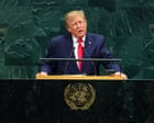 Donald Trump speaking at the UN General Assembly with the U.S. flag backdrop