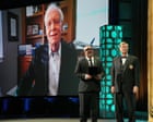 Pilot Chesley Sullenberger standing beside a US Airways aircraft during his Hall of Fame ceremony in Washington, DC