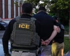 Supreme Court justices seated in the courtroom as they announce the third-country deportation ruling