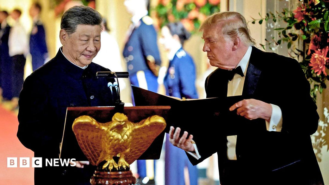 White House state dinner setting with Trump and Xi seated at a long table, surrounded by flags and formal decorations