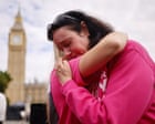 Campaigners wearing pink caps outside the UK Parliament after the assisted dying bill was rejected