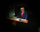 Photo of the United Nations General Assembly hall with the U.S. flag displayed during Trump's speech