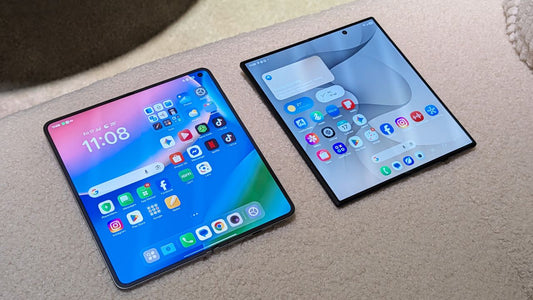 A person holding a foldable phone with a creaseless display