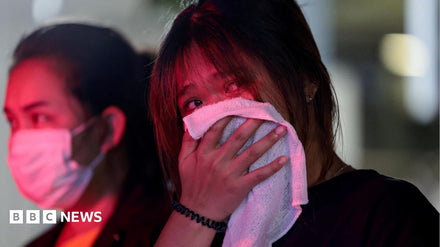 Firefighters responding to a blaze at a Bangkok bar