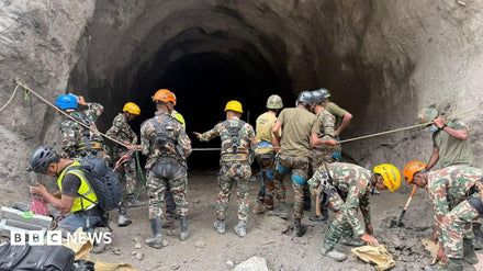 Rescuers detonating explosives on a Nepal hillside to create a passage for trapped hydropower workers