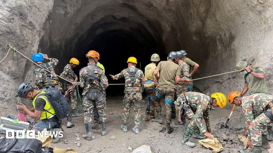 Rescuers detonating explosives on a Nepal hillside to create a passage for trapped hydropower workers