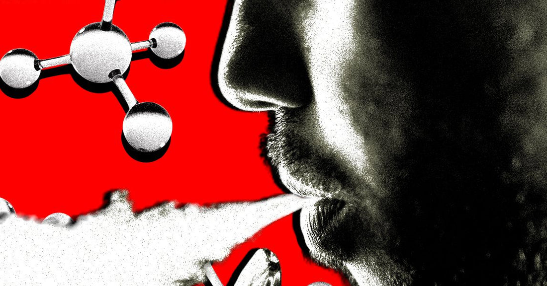 A person holding a vape with a concerned expression
