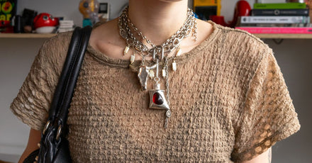 A person wearing a Puff necklace