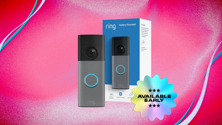 Close-up of Ring $70 video doorbell mounted on a front door with a visible wide-angle lens