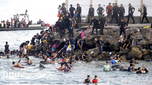 Migrants attempting to cross into Ceuta