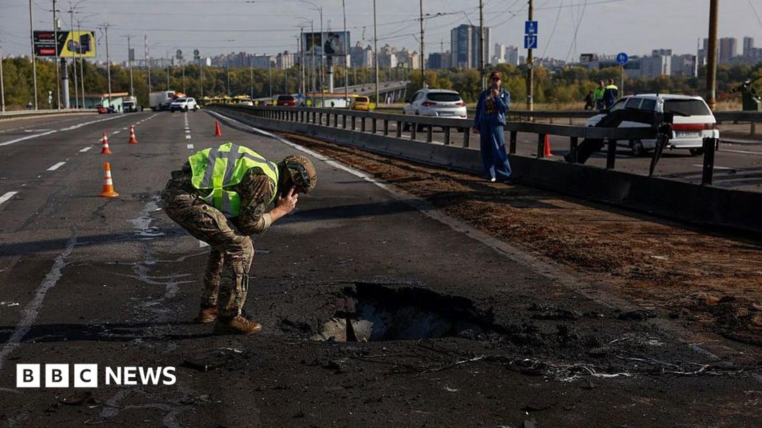 Drone impact on Kyiv's Pivnichyi Bridge with visible fireball and traffic
