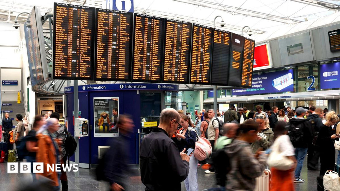 Rail commuters waiting on a platform