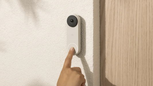 Close-up of a smart video doorbell displaying an AI‑generated greeting on a smartphone screen