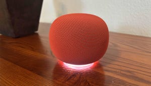A smart light bulb being controlled by a voice assistant