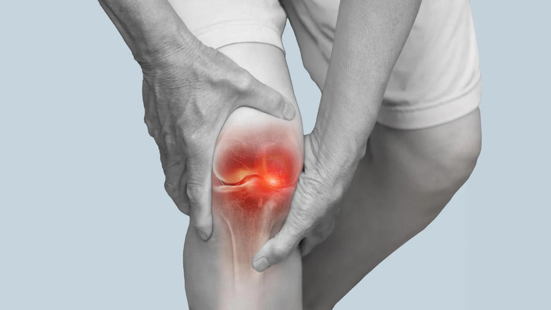 Side view of a person walking with an outward foot angle, highlighting altered knee joint loading