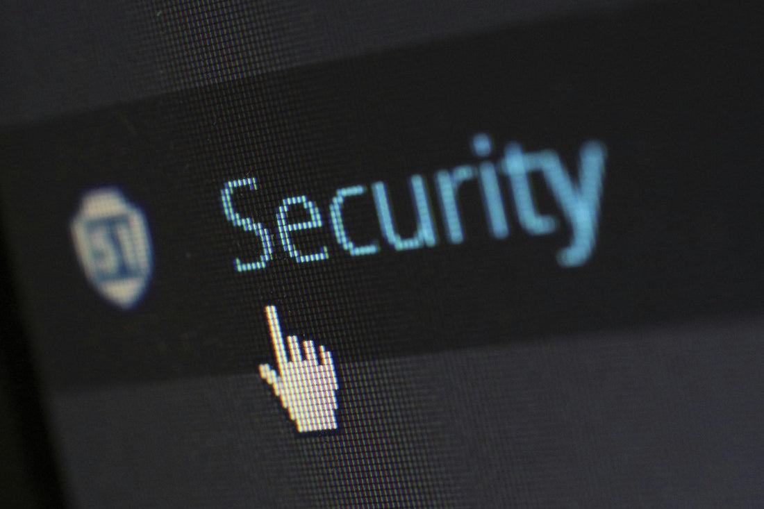 Computer screen displaying the word "Security" with a cursor, highlighting internet safety tips.