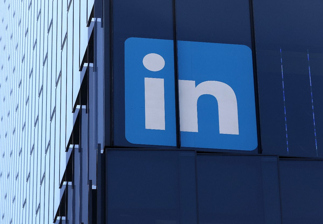 Screenshot of LinkedIn profile showing a peer endorsement badge next to work experience
