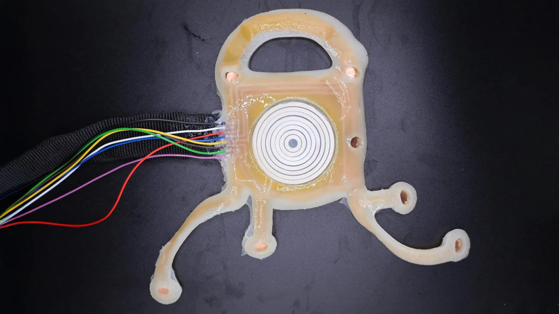 A wearable ultrasound patch on a person's skin