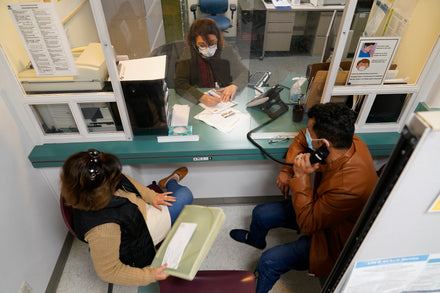 Close-up of a Medicaid enrollment form with a red deadline circle marked Oct 1