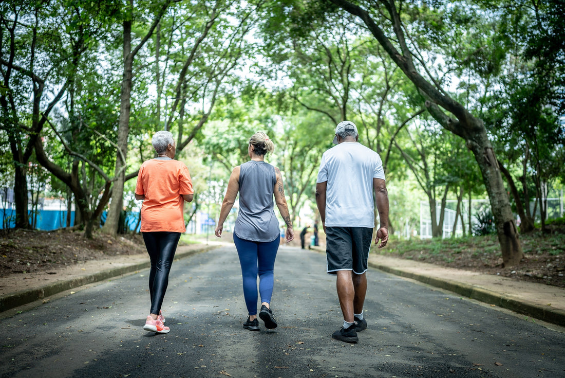 An elderly person walking quickly