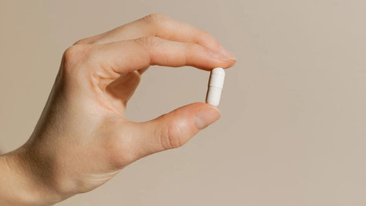 A person taking a pill