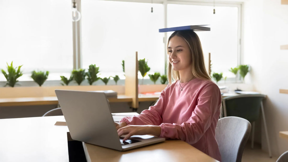 A person sitting at a desk with good posture