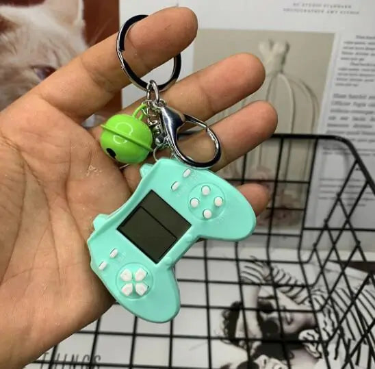 Retro Game Console Keychain Built-in 7 Games by Anti Spier