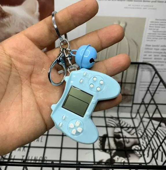 Retro Game Console Keychain Built-in 7 Games by Anti Spier