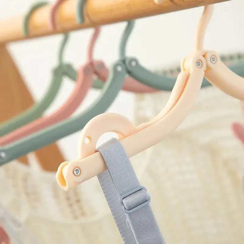 Multi-Functional Folding Clothes Hanger by Anti Spier