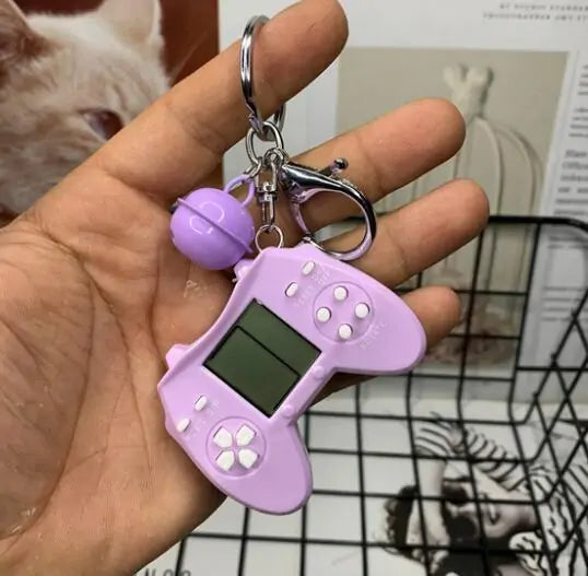 Retro Game Console Keychain Built-in 7 Games by Anti Spier
