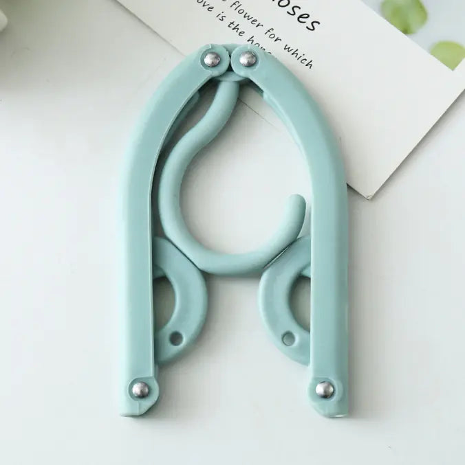 Multi-Functional Folding Clothes Hanger by Anti Spier