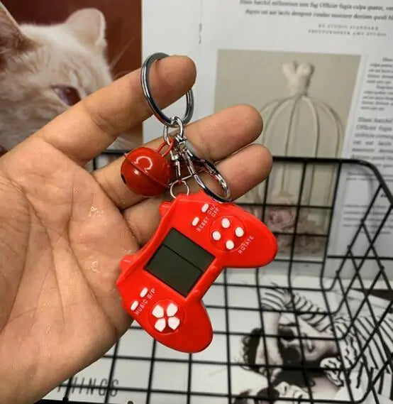 Retro Game Console Keychain Built-in 7 Games by Anti Spier