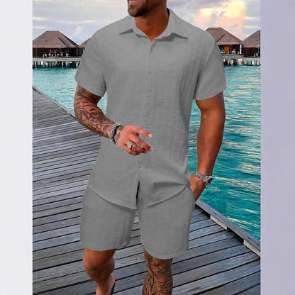 A two-piece set of jacquard black and white solid color short-sleeved men's vacation casual style shirt and shorts by Hypersku