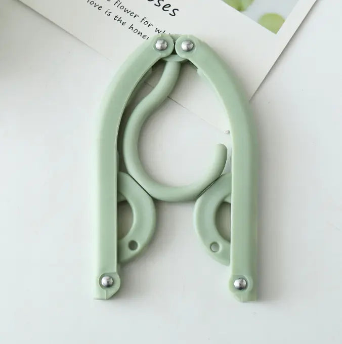 Multi-Functional Folding Clothes Hanger by Anti Spier