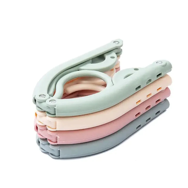 Multi-Functional Folding Clothes Hanger by Anti Spier
