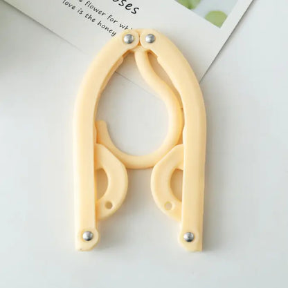 Multi-Functional Folding Clothes Hanger by Anti Spier