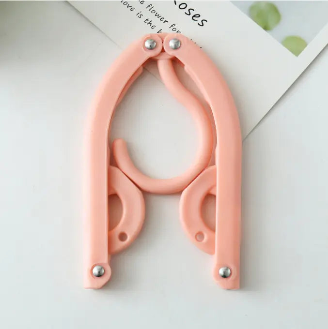 Multi-Functional Folding Clothes Hanger by Anti Spier